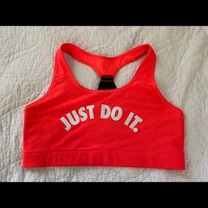 Neon orange Nike sports bra